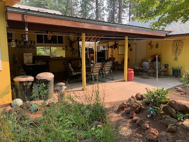 rear view of house featuring a patio area