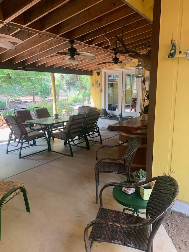 view of patio with ceiling fan and french doors