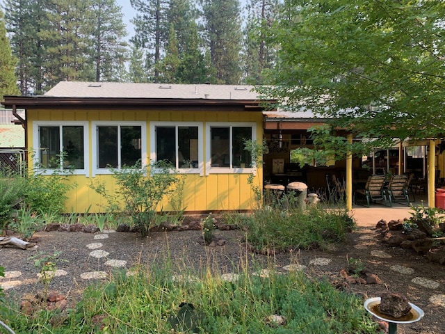 rear view of house featuring a patio