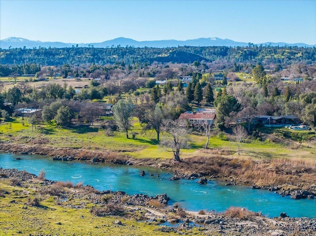 bird's eye view featuring a water and mountain view