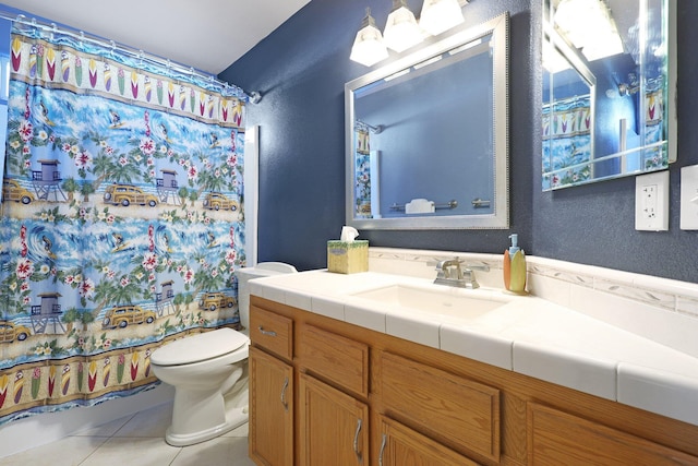 bathroom featuring vanity, a shower with curtain, tile patterned floors, and toilet