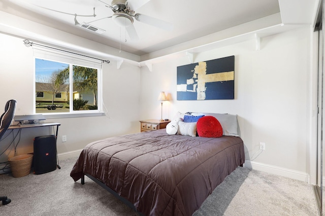 bedroom featuring ceiling fan and light colored carpet