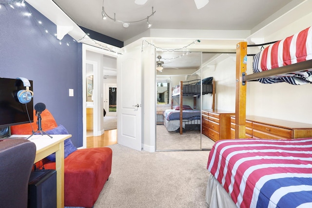 bedroom with a closet and carpet floors