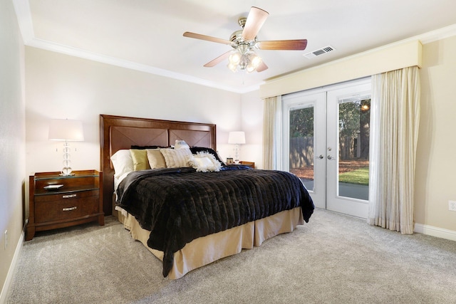 bedroom featuring access to outside, french doors, light carpet, ceiling fan, and crown molding