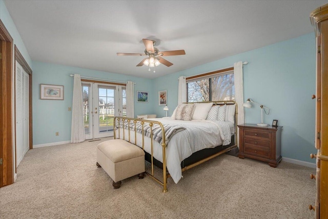 carpeted bedroom featuring ceiling fan and access to exterior