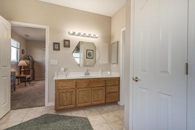 bathroom featuring tile patterned flooring and vanity