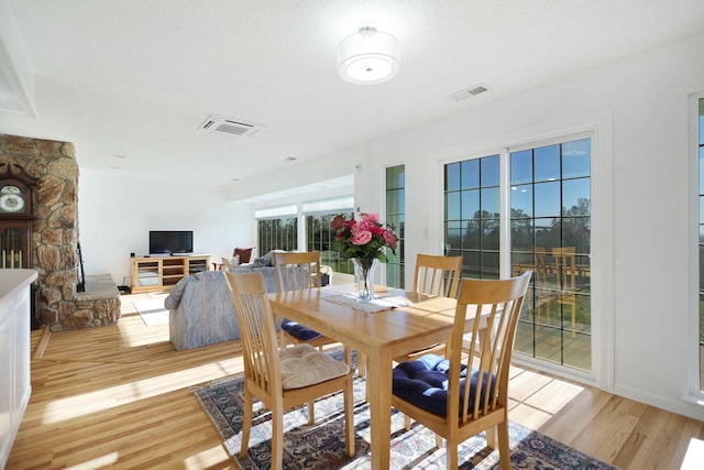 dining room featuring light hardwood / wood-style floors