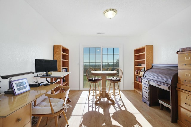 office space featuring light hardwood / wood-style flooring