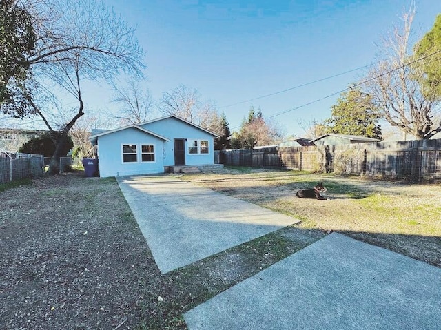 exterior space with a front yard