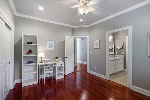 office area featuring ceiling fan, crown molding, wood-type flooring, and sink