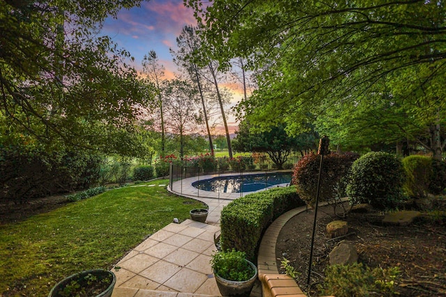 exterior space featuring a patio and a yard