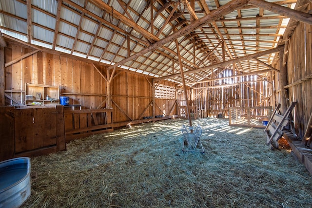 miscellaneous room featuring lofted ceiling