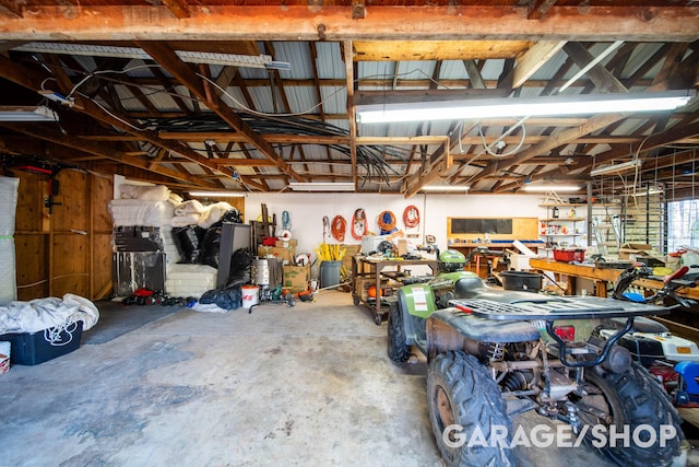 garage with a workshop area