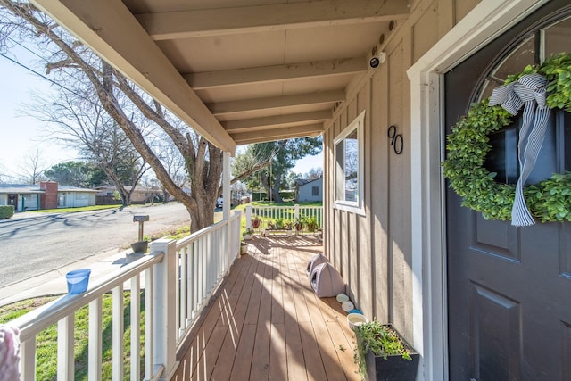 wooden terrace with covered porch