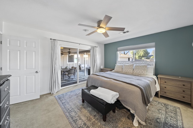 carpeted bedroom with access to outside and ceiling fan