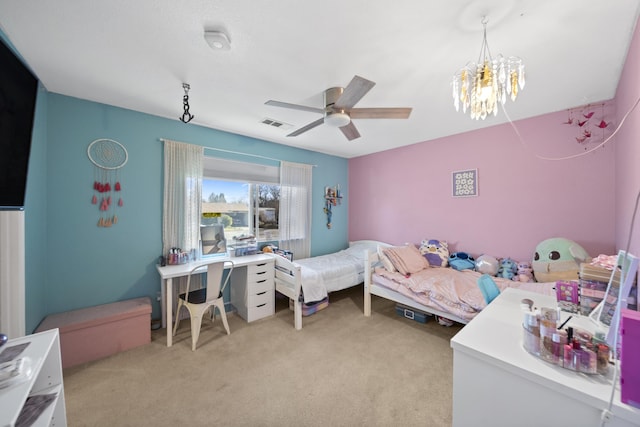 carpeted bedroom with ceiling fan with notable chandelier