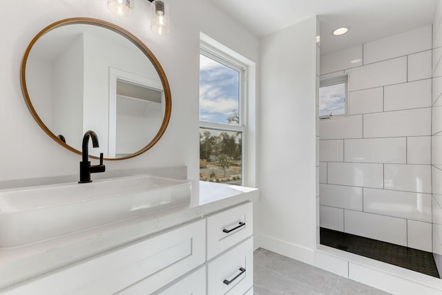 bathroom featuring vanity and tile patterned flooring