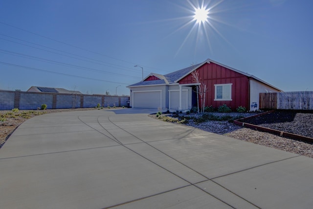 single story home featuring a garage