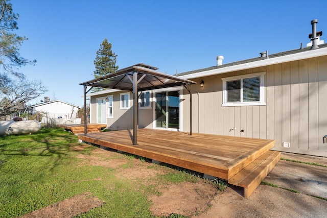 wooden deck with a yard