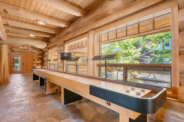 4620 W A Barr Rd, Mount Shasta, CA 96067 - game room with wood ceiling, beam ceiling, and stone tile floors