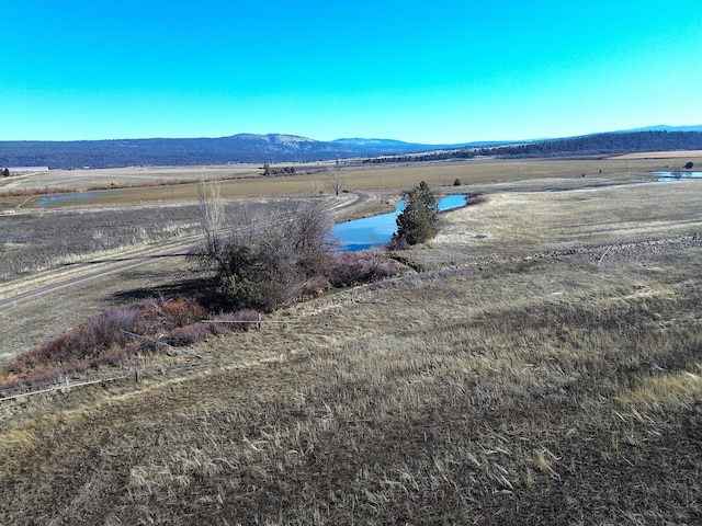 water view with a mountain view and a rural view