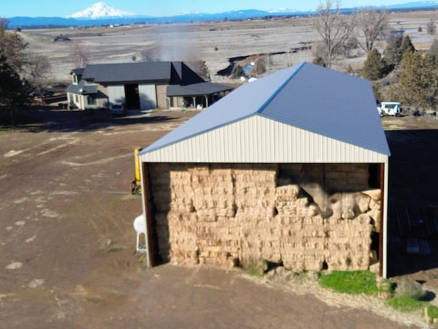 exterior space featuring a mountain view