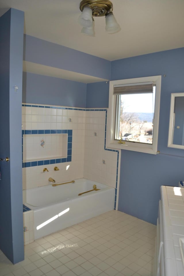 bathroom featuring a tub to relax in