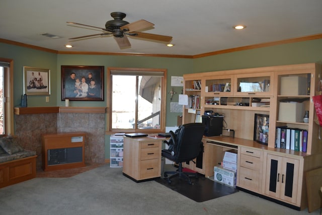 office space with ceiling fan, light colored carpet, and crown molding