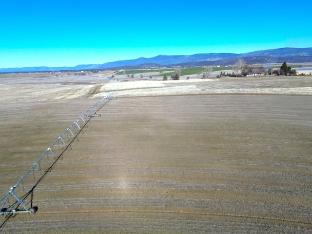 exterior space with a mountain view and a rural view