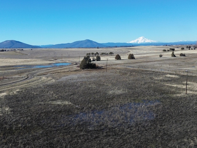 view of mountain feature with a rural view