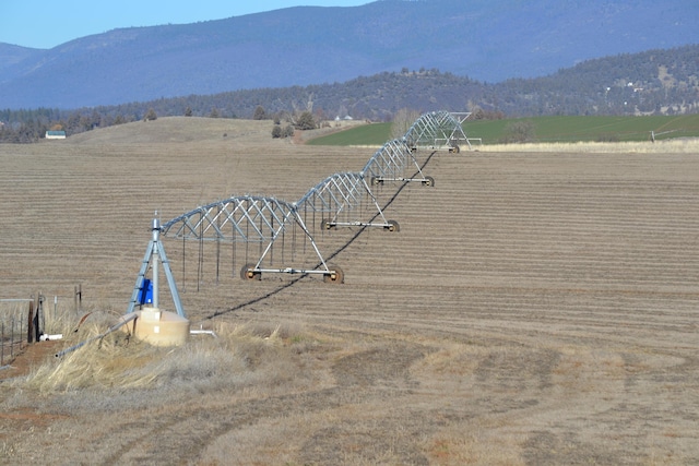 view of mountain feature with a rural view