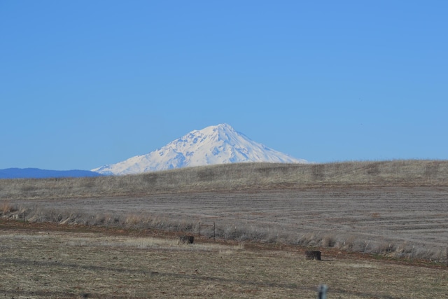 view of mountain feature featuring a rural view