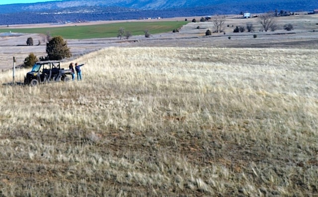 view of mountain feature featuring a rural view