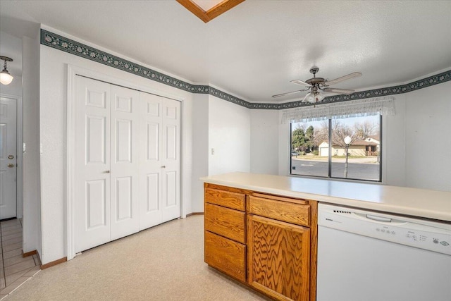 kitchen featuring ceiling fan and dishwasher