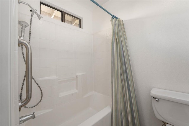 bathroom with shower / bath combination with curtain and toilet