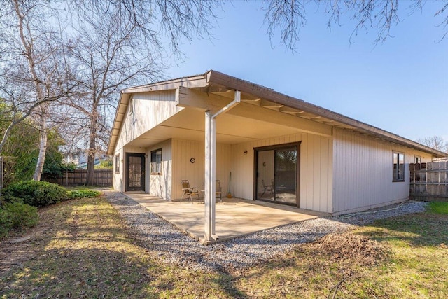 rear view of house featuring a patio area