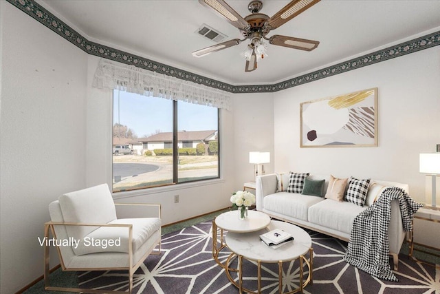 living room featuring ceiling fan