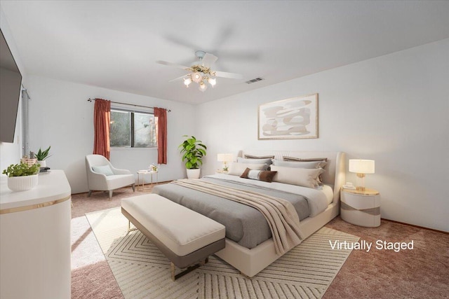 carpeted bedroom featuring ceiling fan