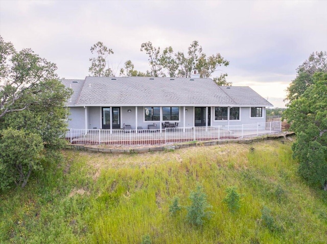 rear view of house featuring a patio area