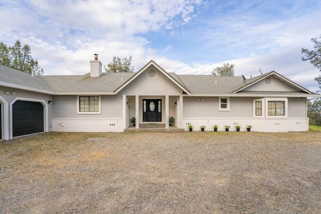 single story home with a garage