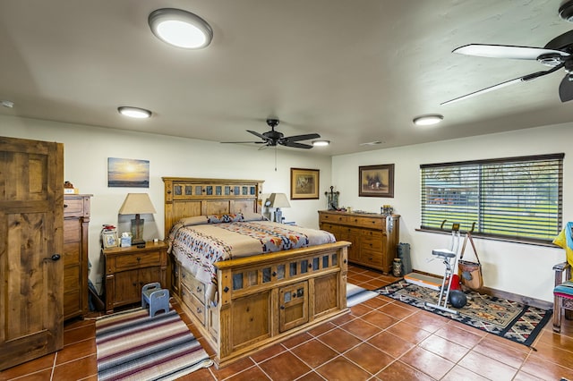 tiled bedroom with ceiling fan