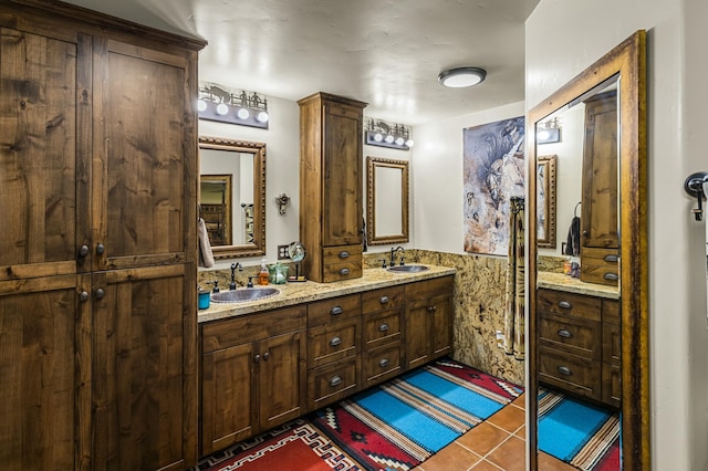 bathroom with vanity and tile patterned flooring