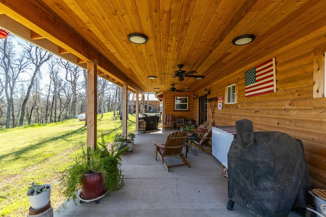 view of patio / terrace with ceiling fan and area for grilling