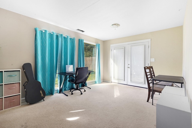 office area with light colored carpet