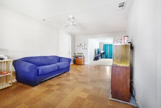 living room with ceiling fan