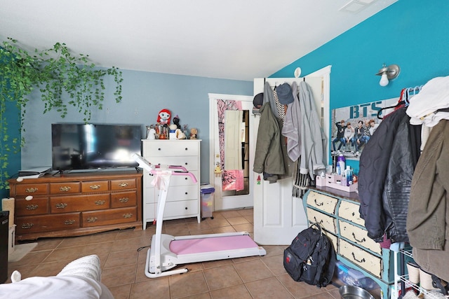 bedroom featuring tile patterned flooring