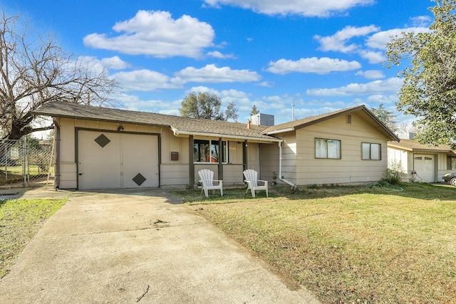 ranch-style home with a garage and a front yard