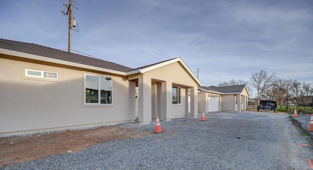 ranch-style home with a garage