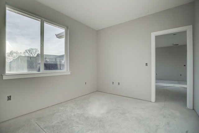 spare room featuring plenty of natural light