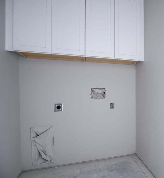 laundry room with cabinets and hookup for an electric dryer